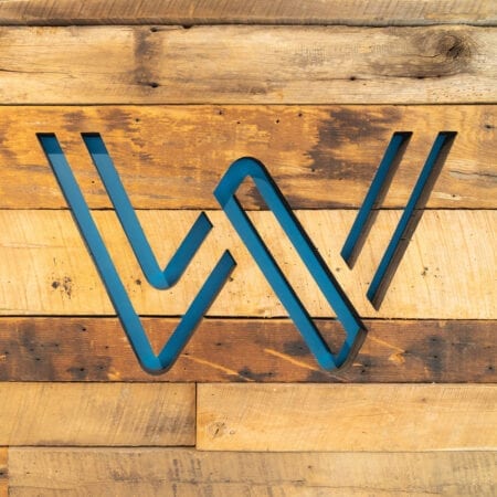 Webb logo on pallet wall