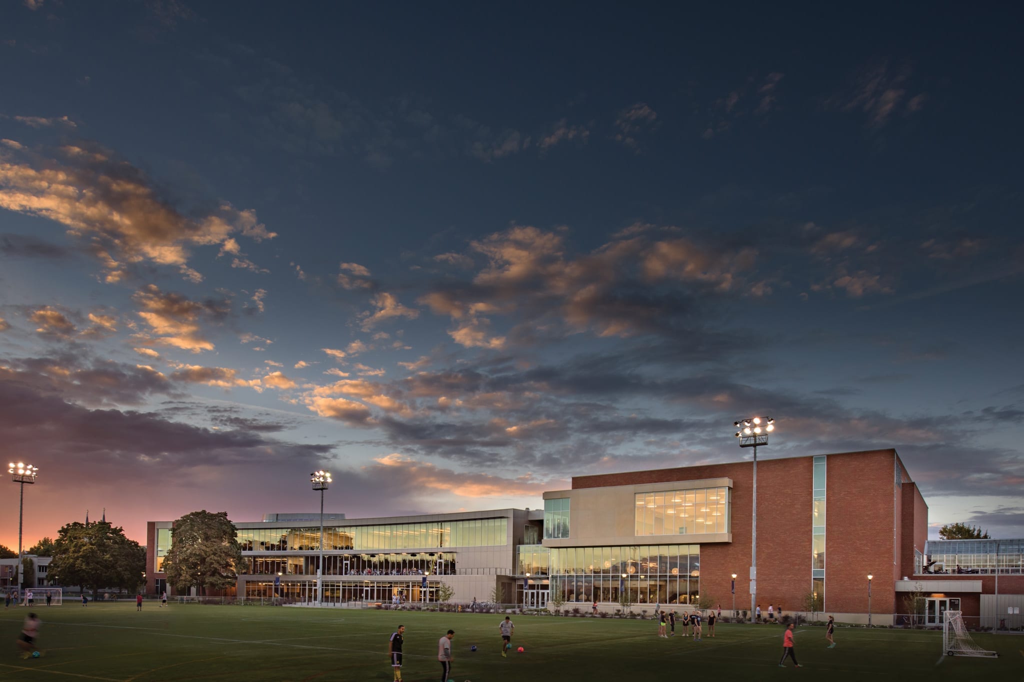 Gonzaga University dining exterior with soccer field in front.