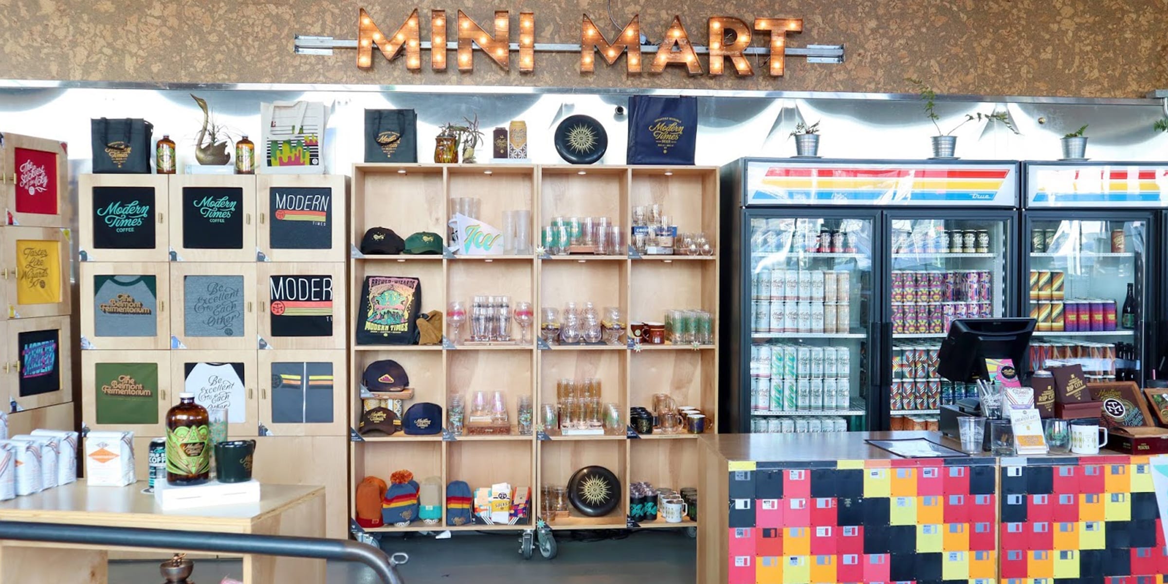 Modern Times Brewery Mini Mart with merchandise and beverages.