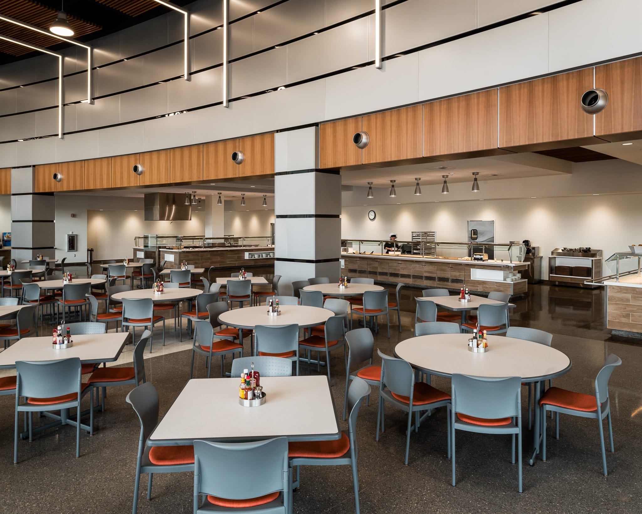 Tables and chairs at dining facility.